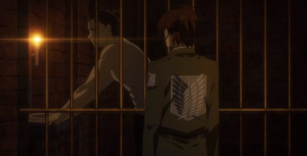 Hange locked up Eren in a cell.